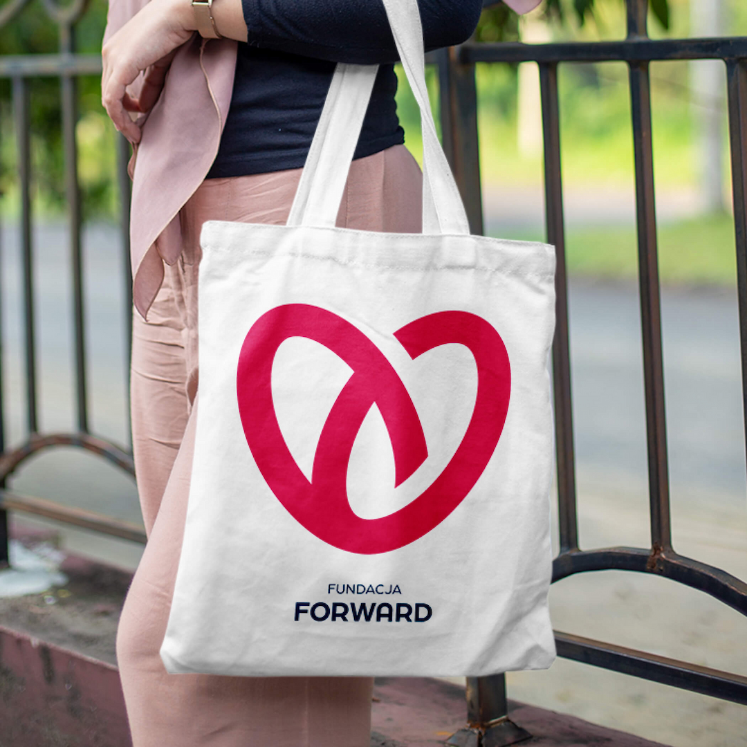 Woman carrying bag with Froward Foundation logo