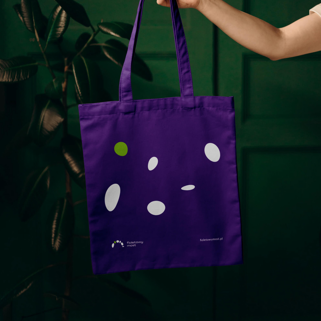 Woman carrying bag with Froward Foundation logo